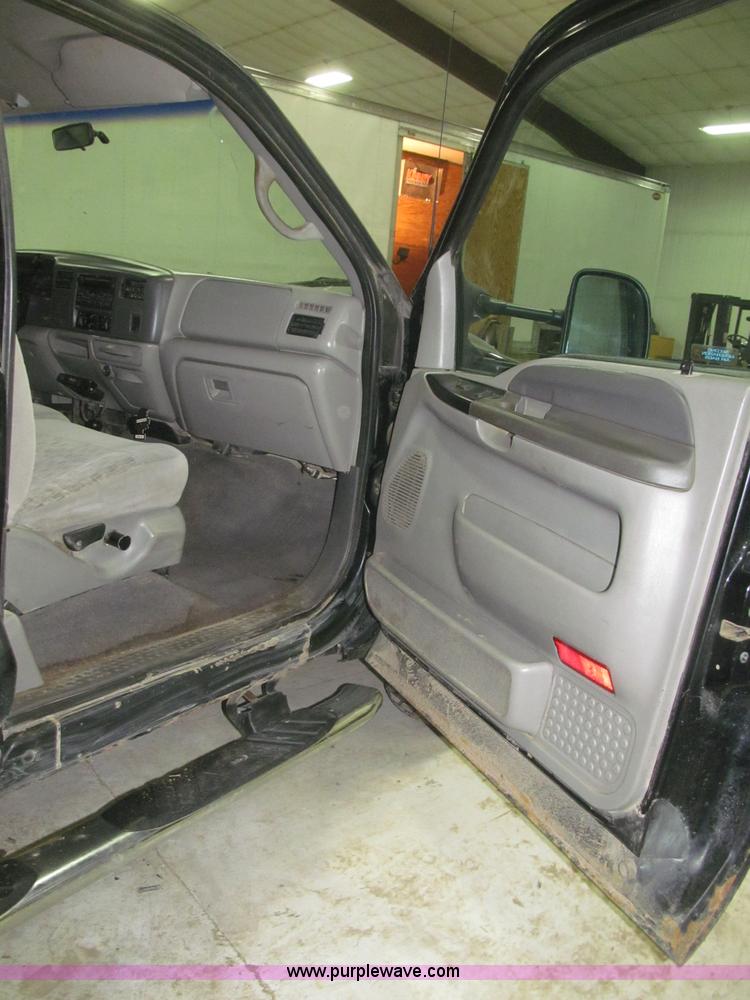 image for item B5400 1999 Ford F350 XLT SuperCab flatbed truck