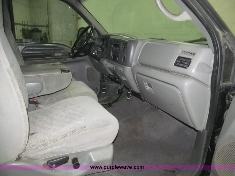 image for item B5400 1999 Ford F350 XLT SuperCab flatbed truck