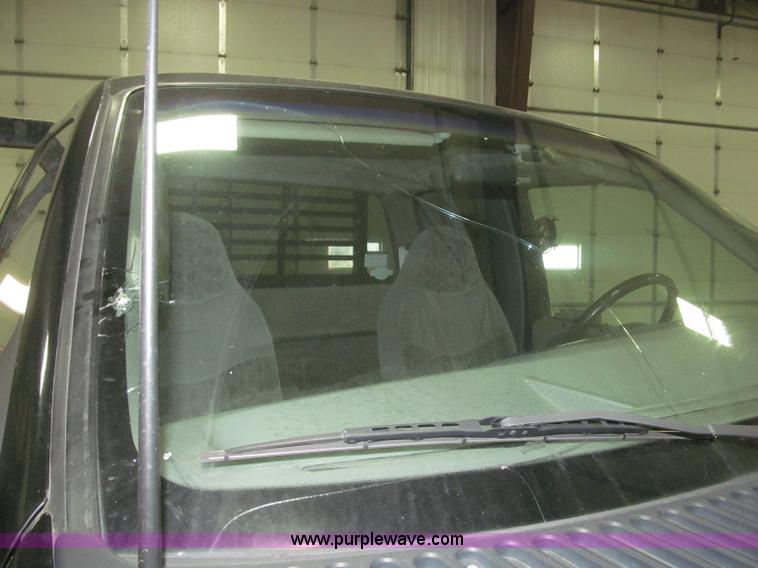 image for item B5400 1999 Ford F350 XLT SuperCab flatbed truck