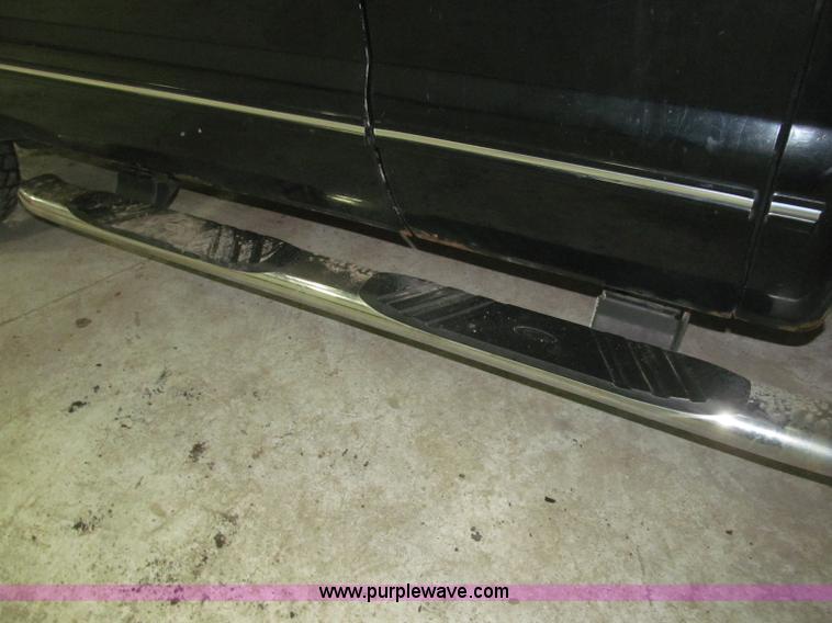 image for item B5400 1999 Ford F350 XLT SuperCab flatbed truck