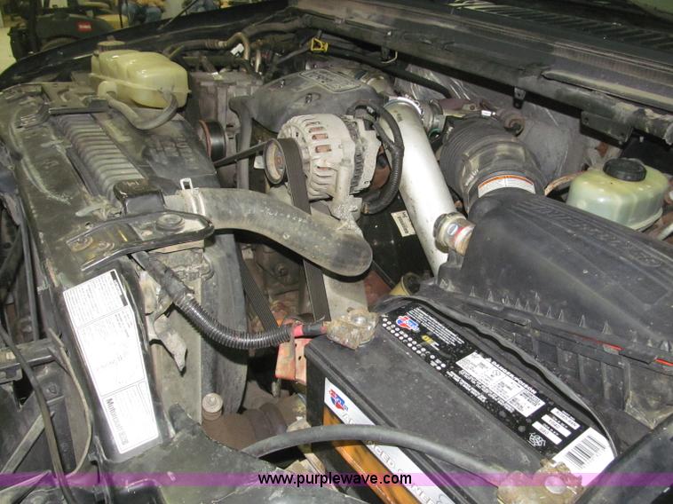 image for item B5400 1999 Ford F350 XLT SuperCab flatbed truck