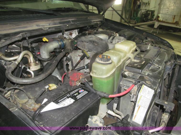 image for item B5400 1999 Ford F350 XLT SuperCab flatbed truck