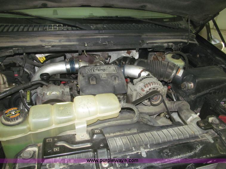 image for item B5400 1999 Ford F350 XLT SuperCab flatbed truck