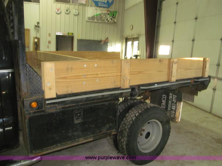 image for item B5400 1999 Ford F350 XLT SuperCab flatbed truck