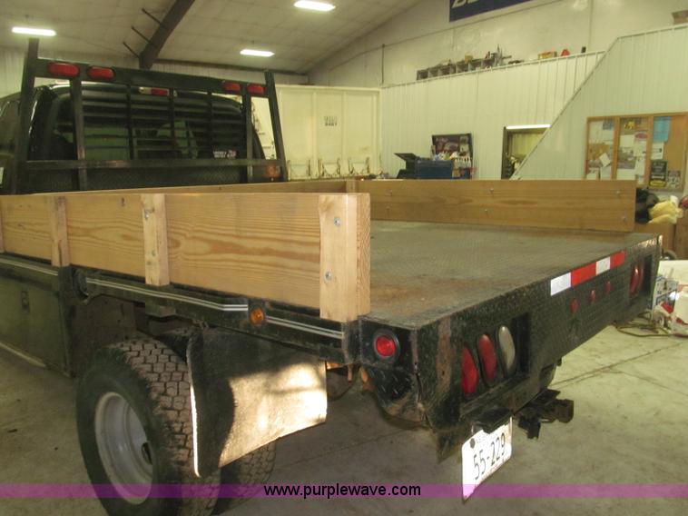image for item B5400 1999 Ford F350 XLT SuperCab flatbed truck