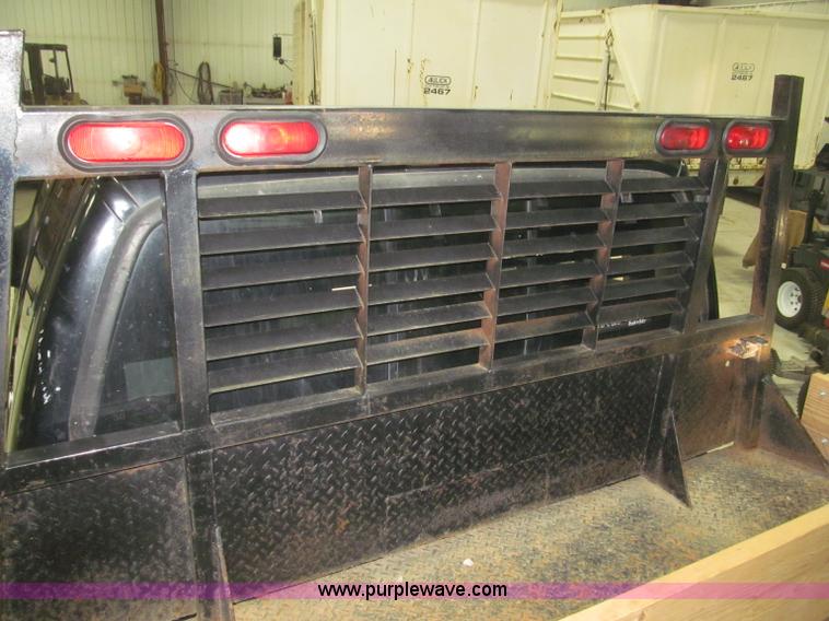 image for item B5400 1999 Ford F350 XLT SuperCab flatbed truck