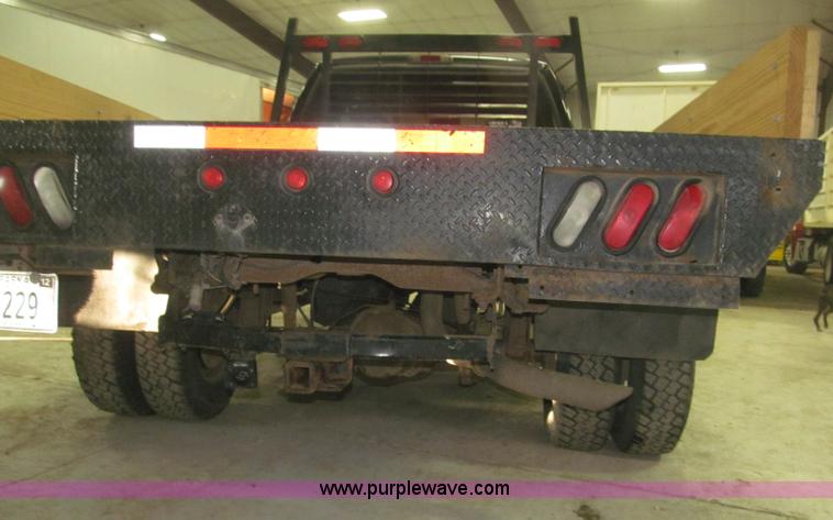 image for item B5400 1999 Ford F350 XLT SuperCab flatbed truck