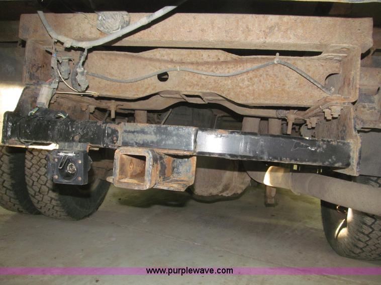 image for item B5400 1999 Ford F350 XLT SuperCab flatbed truck