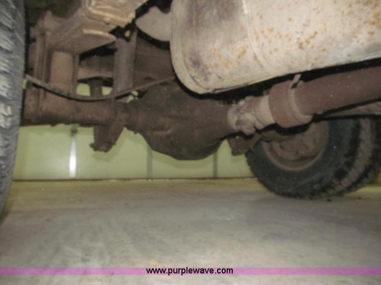 image for item B5400 1999 Ford F350 XLT SuperCab flatbed truck