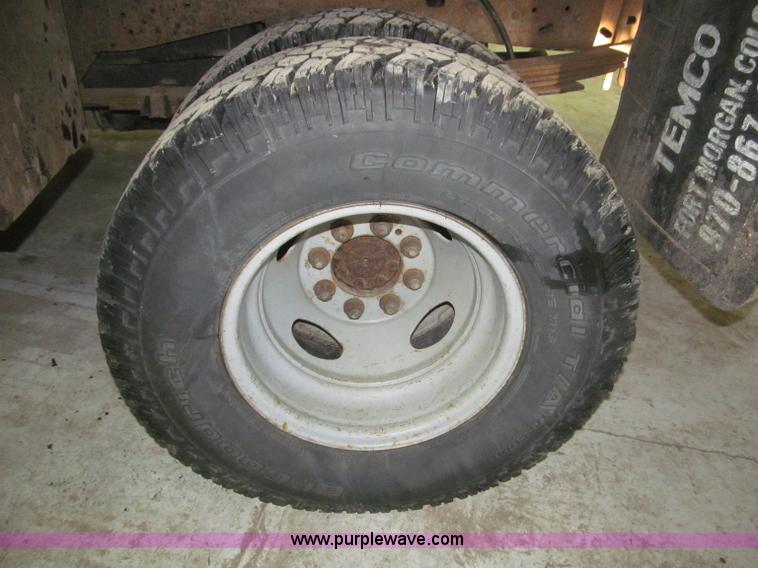 image for item B5400 1999 Ford F350 XLT SuperCab flatbed truck