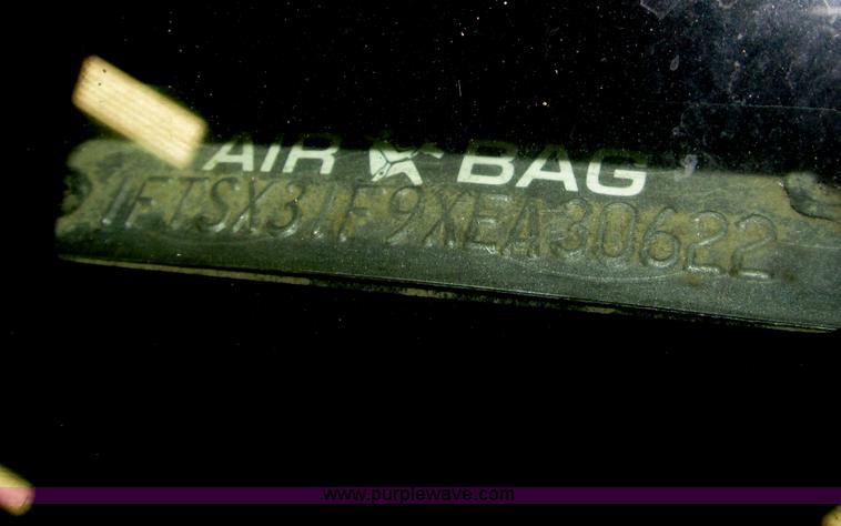 image for item B5400 1999 Ford F350 XLT SuperCab flatbed truck