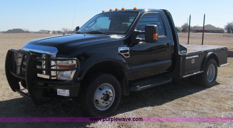 image for item F3130 2008 Ford F350 Super Duty flatbed pickup truck