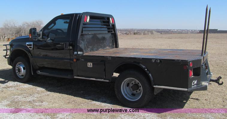 image for item F3130 2008 Ford F350 Super Duty flatbed pickup truck