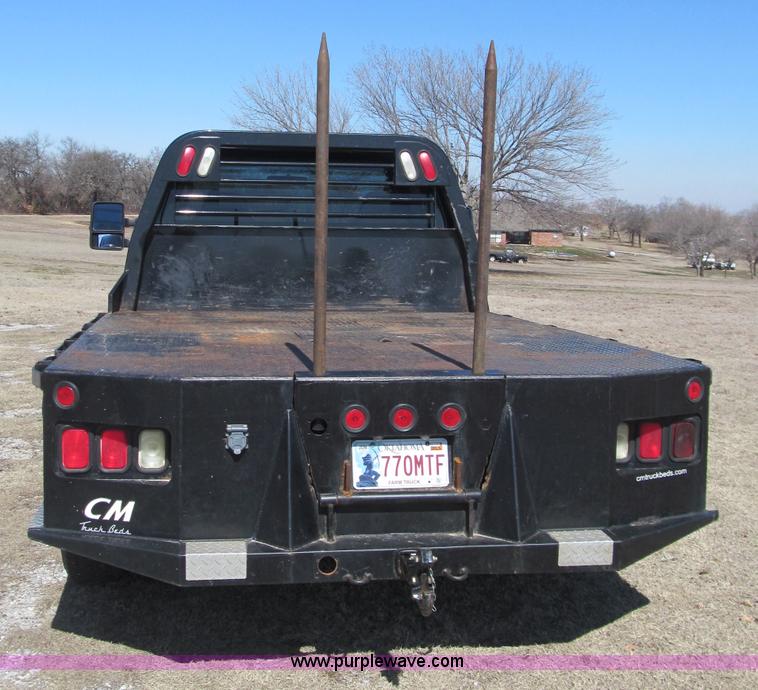 image for item F3130 2008 Ford F350 Super Duty flatbed pickup truck