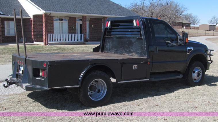 image for item F3130 2008 Ford F350 Super Duty flatbed pickup truck