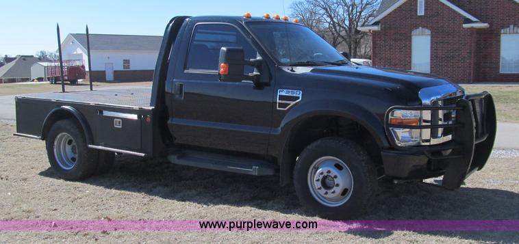 image for item F3130 2008 Ford F350 Super Duty flatbed pickup truck