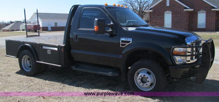 image for item F3130 2008 Ford F350 Super Duty flatbed pickup truck
