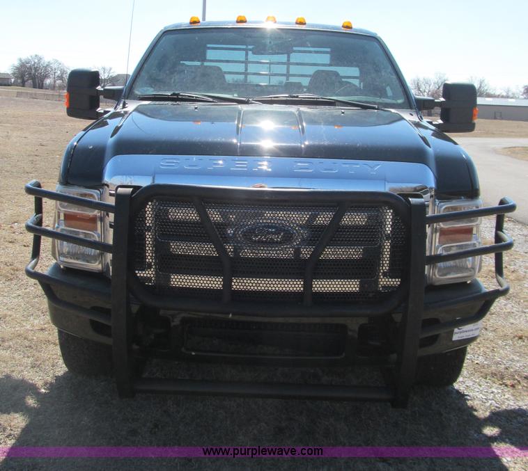 image for item F3130 2008 Ford F350 Super Duty flatbed pickup truck