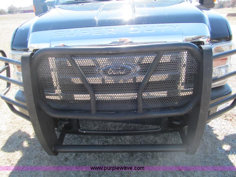image for item F3130 2008 Ford F350 Super Duty flatbed pickup truck