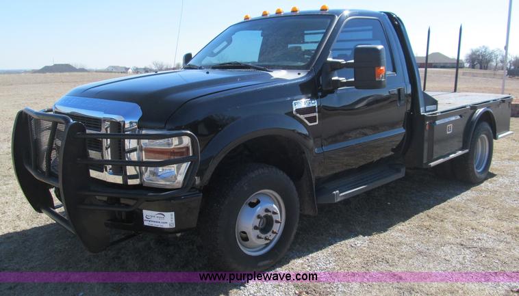 image for item F3130 2008 Ford F350 Super Duty flatbed pickup truck