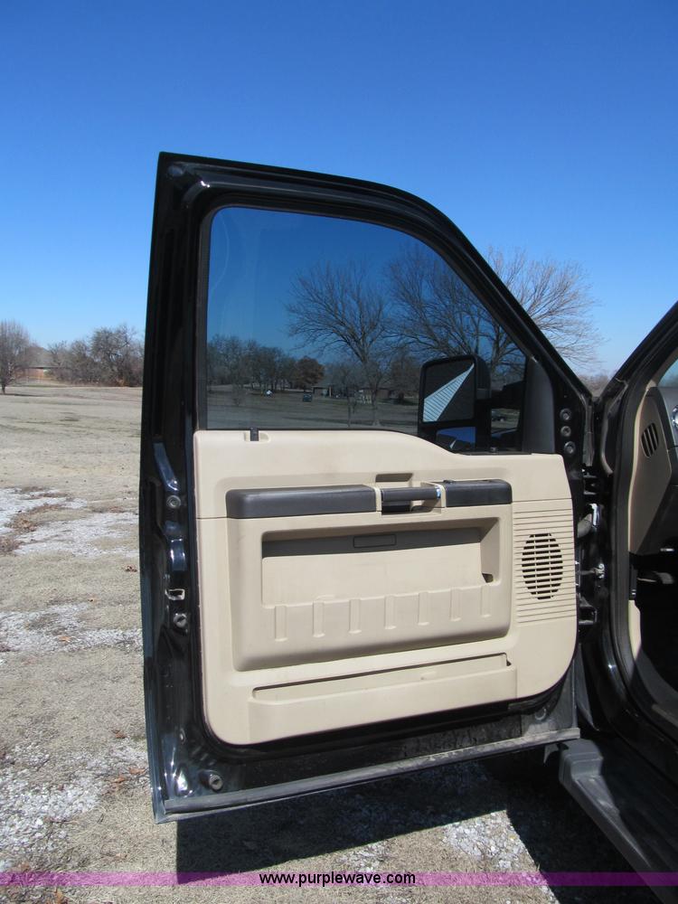 image for item F3130 2008 Ford F350 Super Duty flatbed pickup truck