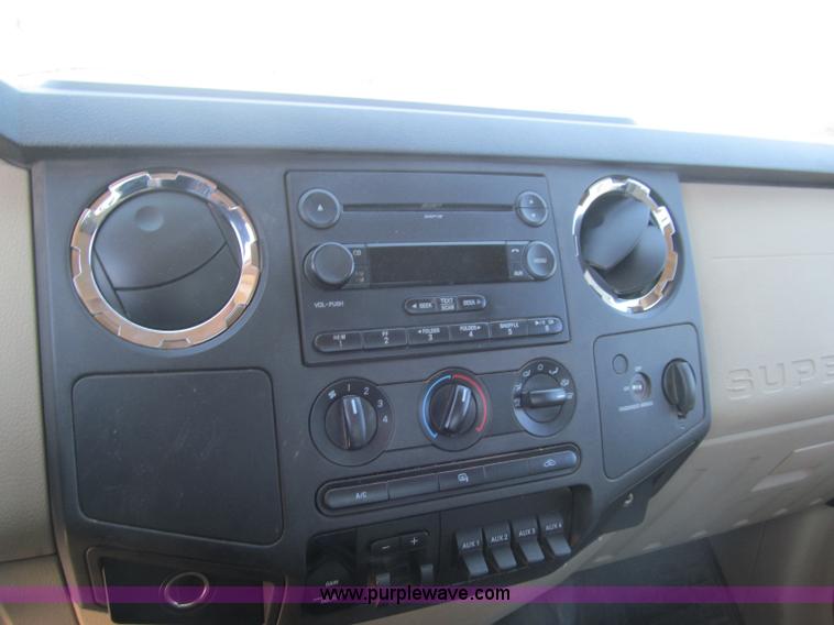 image for item F3130 2008 Ford F350 Super Duty flatbed pickup truck