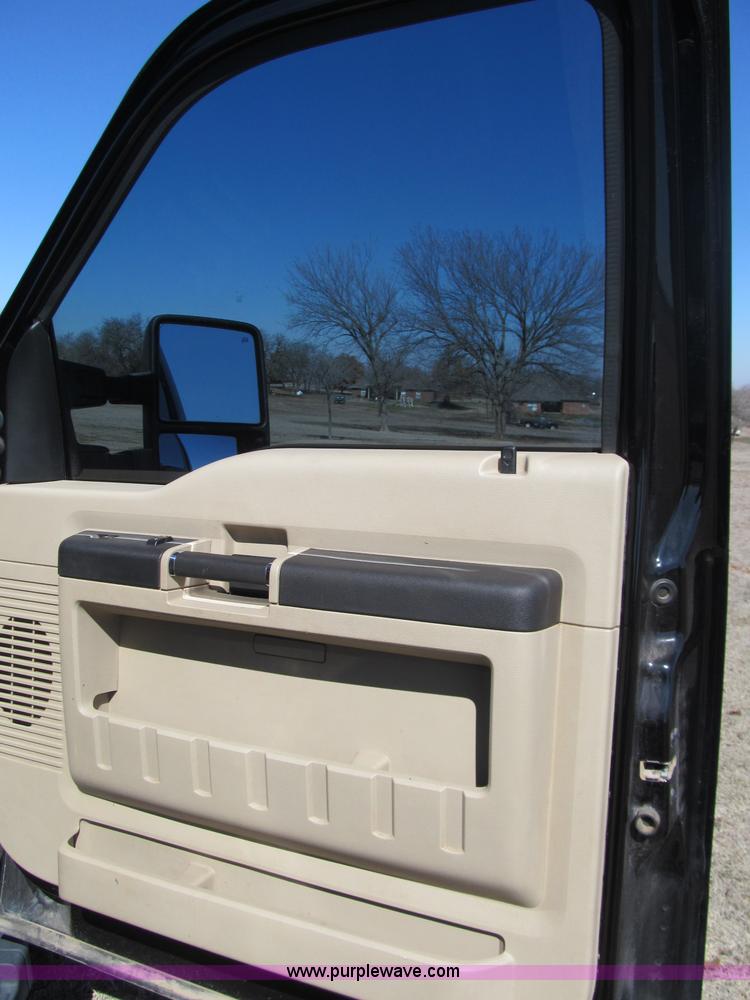 image for item F3130 2008 Ford F350 Super Duty flatbed pickup truck