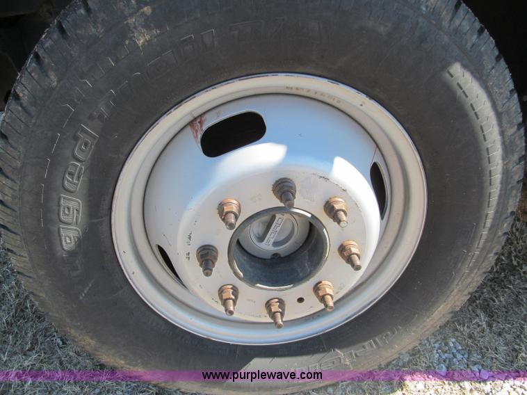 image for item F3130 2008 Ford F350 Super Duty flatbed pickup truck