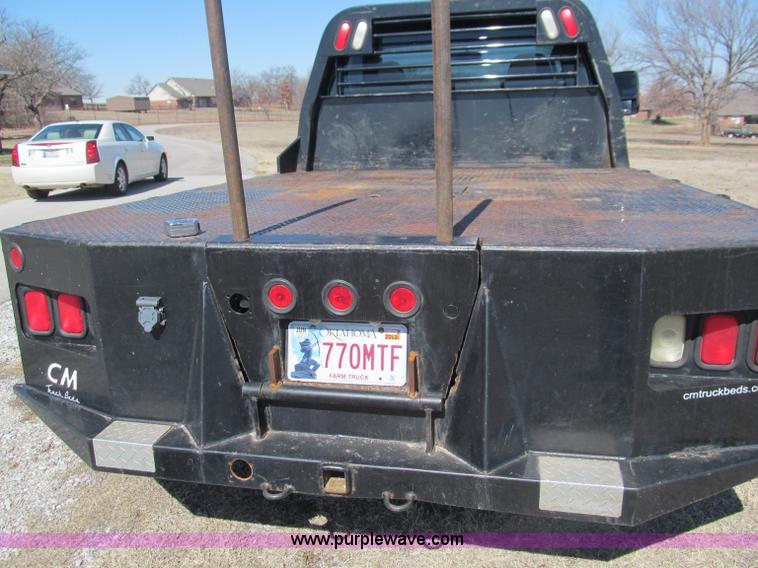 image for item F3130 2008 Ford F350 Super Duty flatbed pickup truck