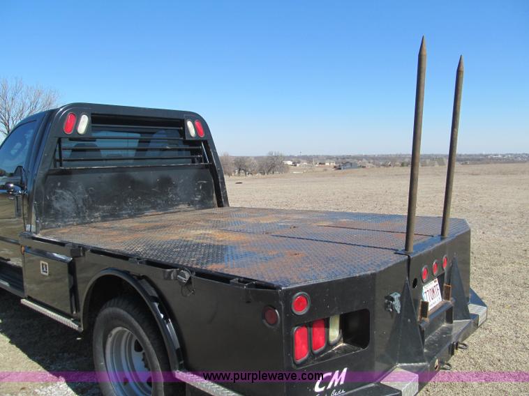image for item F3130 2008 Ford F350 Super Duty flatbed pickup truck
