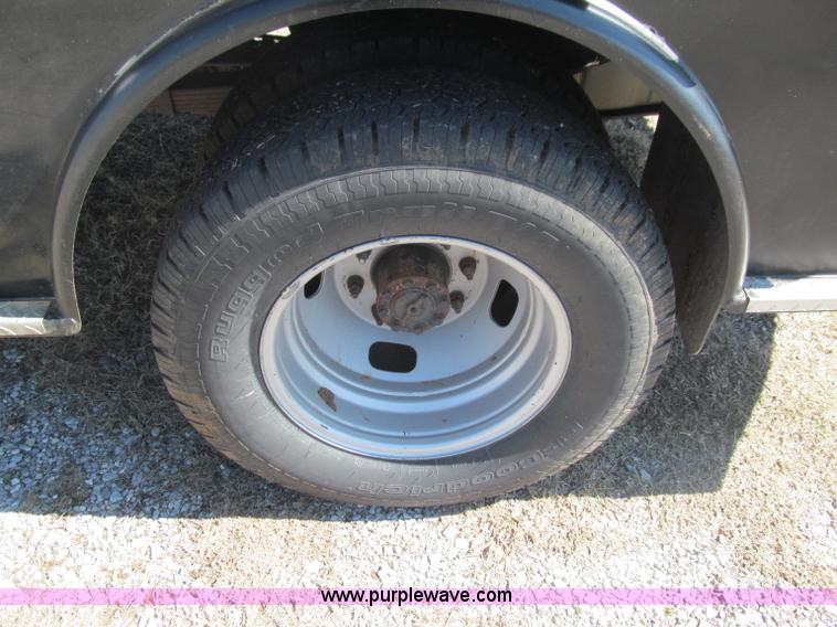 image for item F3130 2008 Ford F350 Super Duty flatbed pickup truck