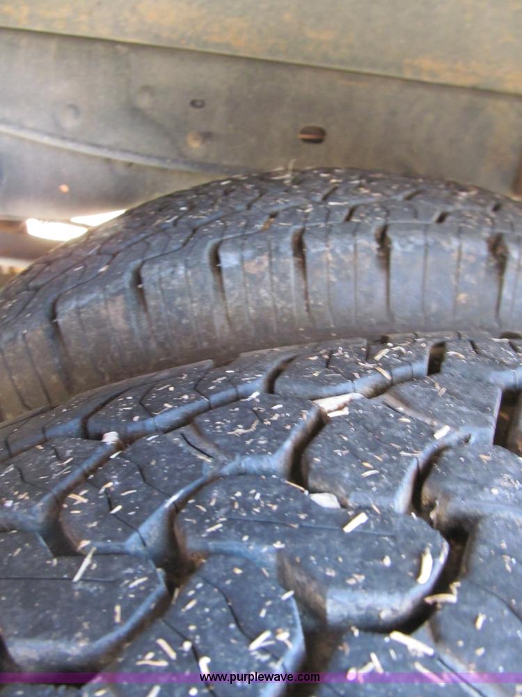 image for item F3130 2008 Ford F350 Super Duty flatbed pickup truck