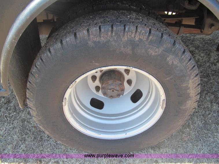 image for item F3130 2008 Ford F350 Super Duty flatbed pickup truck