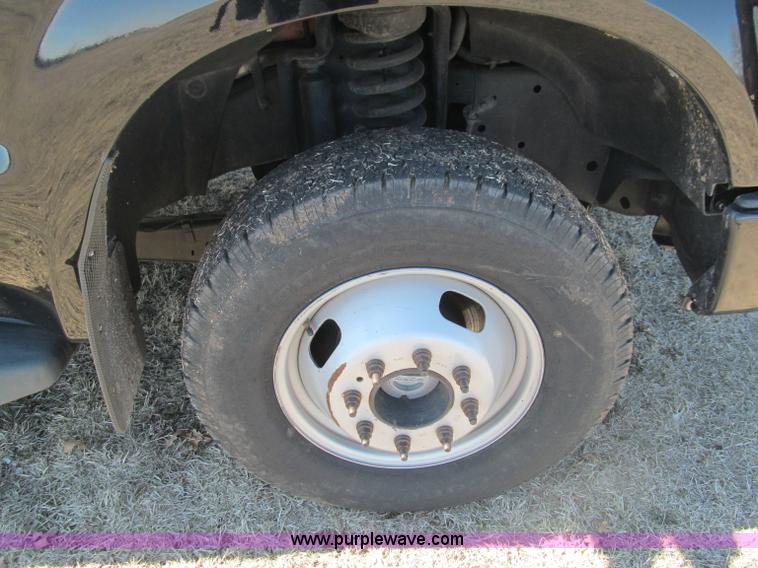 image for item F3130 2008 Ford F350 Super Duty flatbed pickup truck