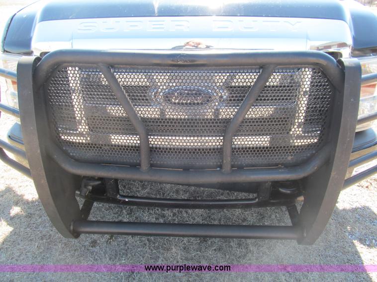 image for item F3130 2008 Ford F350 Super Duty flatbed pickup truck