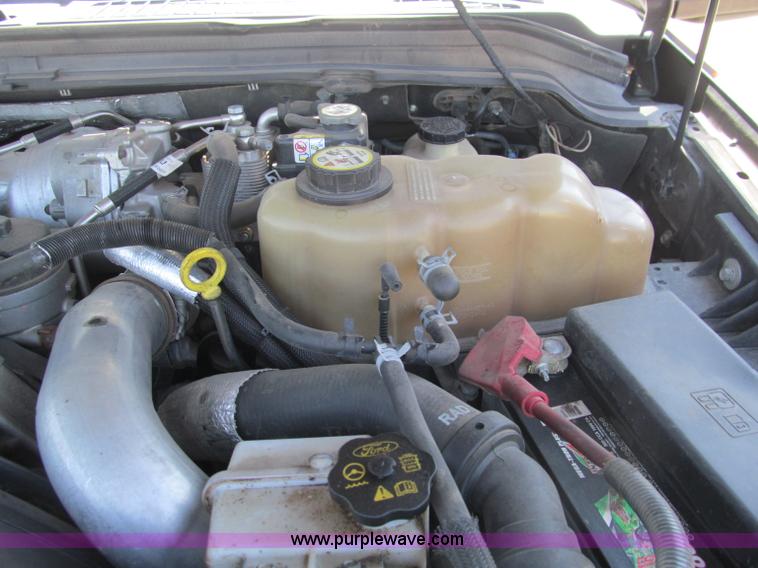 image for item F3130 2008 Ford F350 Super Duty flatbed pickup truck