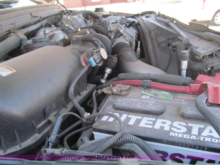 image for item F3130 2008 Ford F350 Super Duty flatbed pickup truck