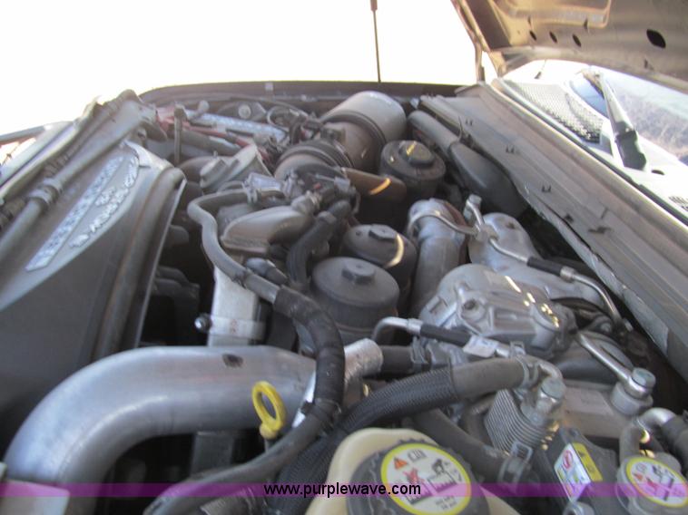 image for item F3130 2008 Ford F350 Super Duty flatbed pickup truck