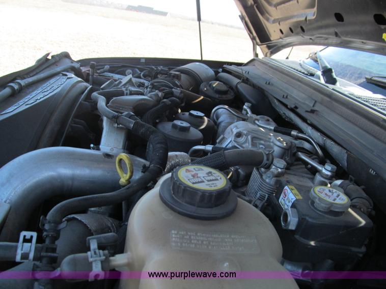 image for item F3130 2008 Ford F350 Super Duty flatbed pickup truck