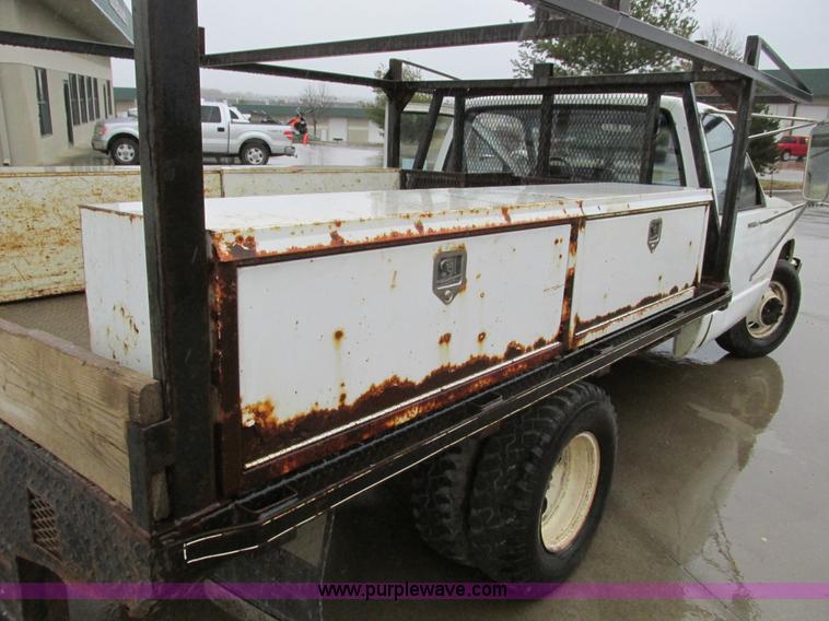 image for item F4399 1990 Chevrolet 3500 flatbed pickup truck