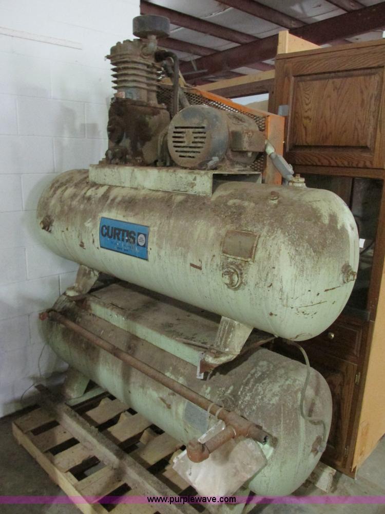 image for item X9863 Three phase dual tank air compressor