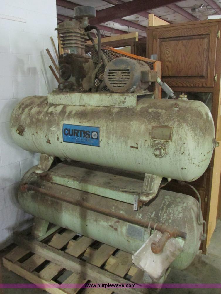 image for item X9863 Three phase dual tank air compressor