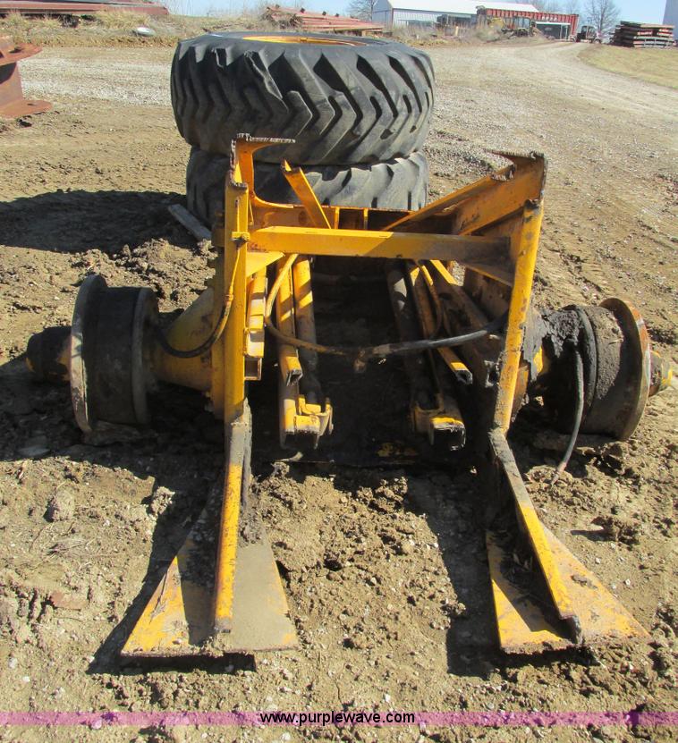 image for item X9869 Two tires and rear frame/punched off of pull-type scraper