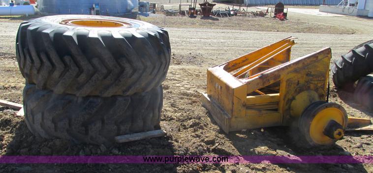image for item X9869 Two tires and rear frame/punched off of pull-type scraper