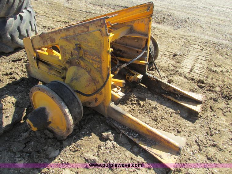 image for item X9869 Two tires and rear frame/punched off of pull-type scraper