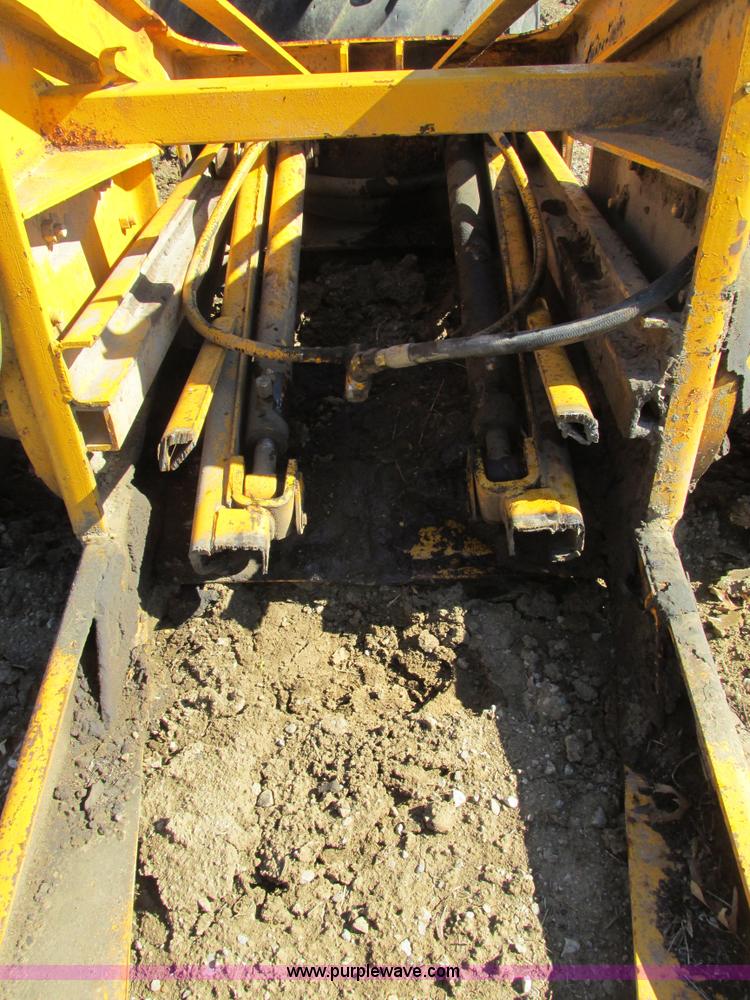 image for item X9869 Two tires and rear frame/punched off of pull-type scraper