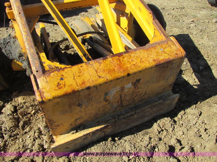 image for item X9869 Two tires and rear frame/punched off of pull-type scraper