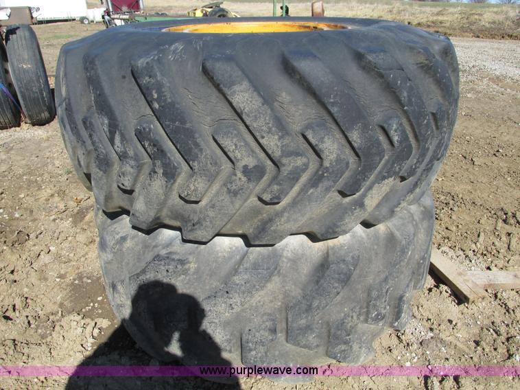 image for item X9869 Two tires and rear frame/punched off of pull-type scraper