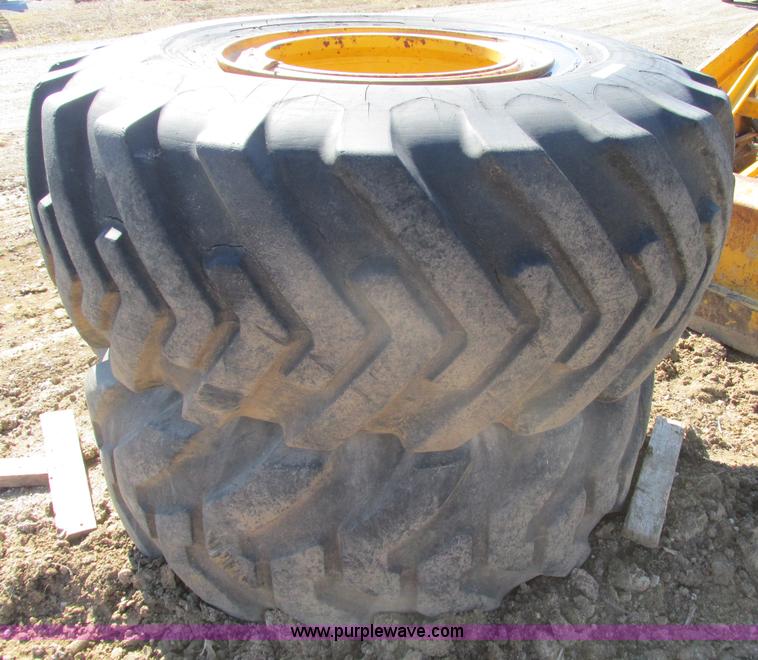 image for item X9869 Two tires and rear frame/punched off of pull-type scraper