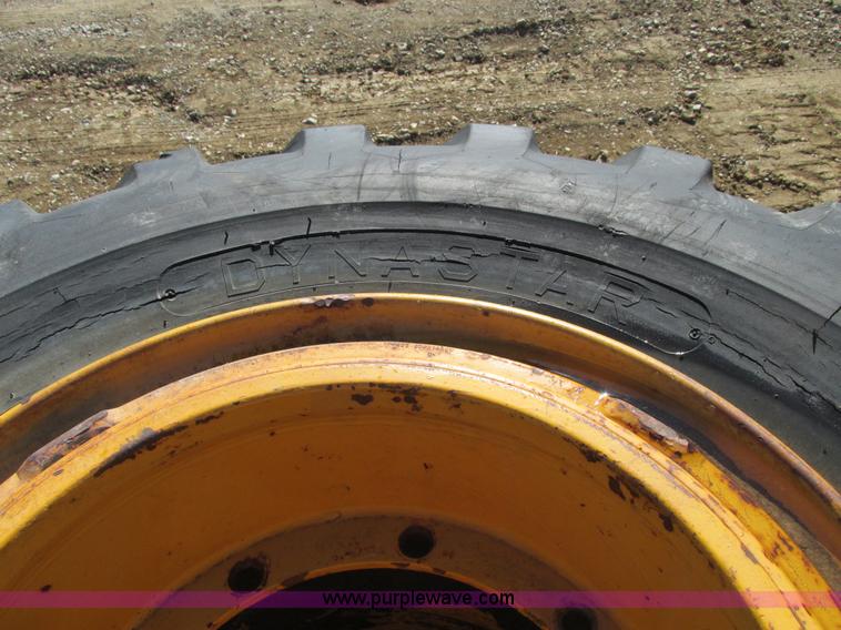 image for item X9869 Two tires and rear frame/punched off of pull-type scraper